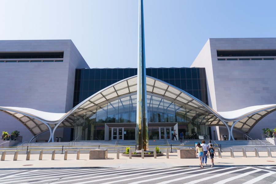 The modern, silver exterior of the National Air & Space Museum in Washington, DC.