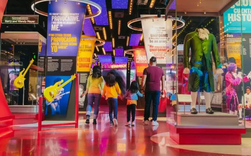 Family walking through National Museum of American History
